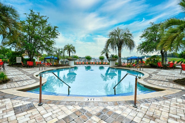 8121 Amalfi Pl Unit 7-805, Myrtle Beach, SC 29572 - community pool with a patio