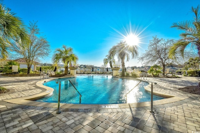 8121 Amalfi Pl Unit 7-805, Myrtle Beach, SC 29572 - community pool with a patio