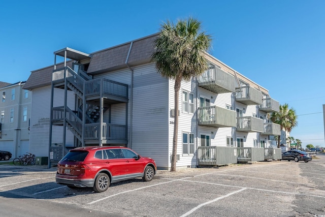 300 47th Ave S Unit 1F, North Myrtle Beach, SC 29582 - view of property featuring uncovered parking