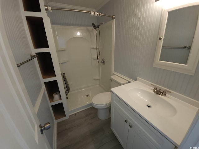300 47th Ave S Unit 1F, North Myrtle Beach, SC 29582 - bathroom featuring a shower stall, wood finished floors, toilet, vanity, and wallpapered walls