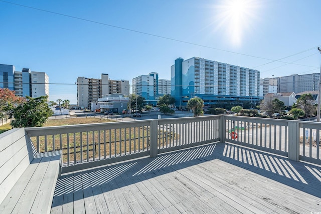 300 47th Ave S Unit 1F, North Myrtle Beach, SC 29582 - wooden terrace featuring a city view