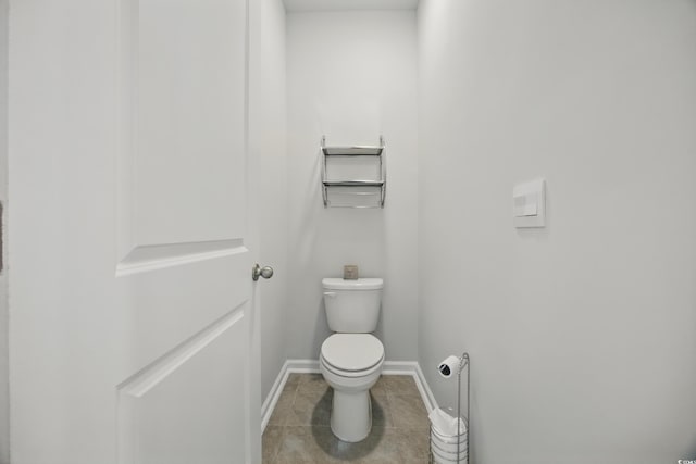 1723 Perthshire Loop, Myrtle Beach, SC 29579 - bathroom featuring toilet, tile patterned floors, and baseboards