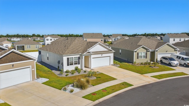1723 Perthshire Loop, Myrtle Beach, SC 29579 - traditional-style house with a residential view, concrete driveway, roof with shingles, a front yard, and a garage