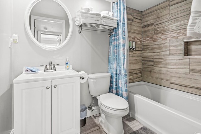 2500 N Ocean Blvd Ph 1, Myrtle Beach, SC 29577 - full bathroom featuring toilet, shower / tub combo with curtain, and vanity