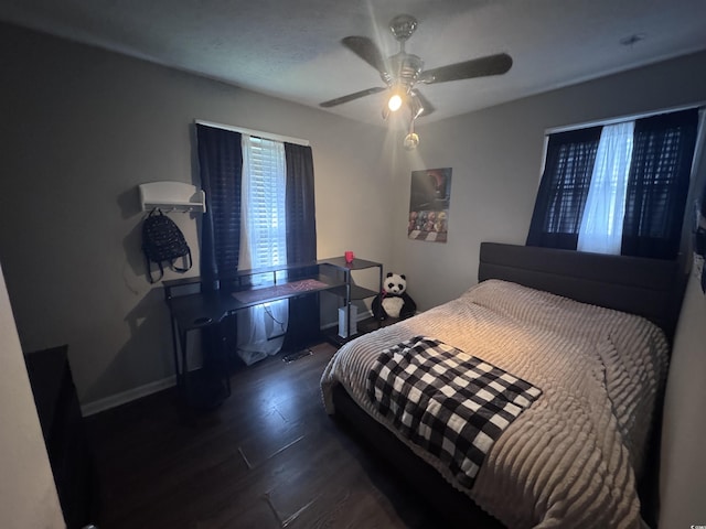 1903 Rose St, Conway, SC 29527 - bedroom featuring dark wood-style flooring, a ceiling fan, and baseboards