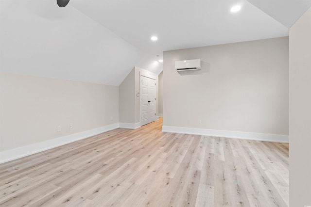2205 Yellow Morel Way, Myrtle Beach, SC 29579 - bonus room featuring a wall unit AC, baseboards, lofted ceiling, light wood-style flooring, and recessed lighting