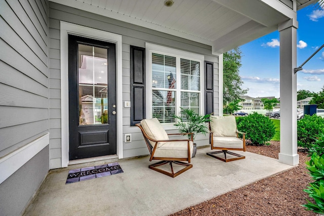 620 Lorenzo Dr Unit 620, North Myrtle Beach, SC 29582 - doorway to property featuring covered porch