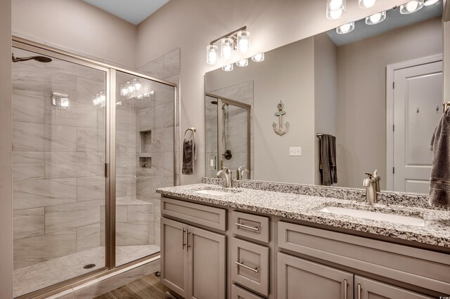 620 Lorenzo Dr Unit 620, North Myrtle Beach, SC 29582 - full bath with double vanity, a stall shower, and wood finished floors
