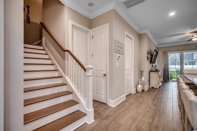 620 Lorenzo Dr Unit 620, North Myrtle Beach, SC 29582 - stairs featuring a ceiling fan, baseboards, ornamental molding, wood finished floors, and recessed lighting