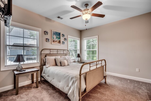620 Lorenzo Dr Unit 620, North Myrtle Beach, SC 29582 - carpeted bedroom featuring baseboards and ceiling fan