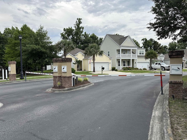 620 Lorenzo Dr Unit 620, North Myrtle Beach, SC 29582 - view of asphalt street featuring curbs and street lights