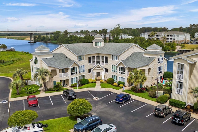 222 Landing Rd Unit 1811, North Myrtle Beach, SC 29582 - view of building exterior featuring uncovered parking and a water view
