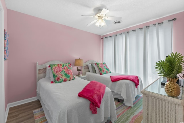 222 Landing Rd Unit 1811, North Myrtle Beach, SC 29582 - bedroom with ceiling fan and wood finished floors