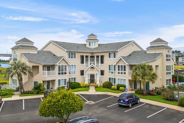 222 Landing Rd Unit 1811, North Myrtle Beach, SC 29582 - view of building exterior with uncovered parking
