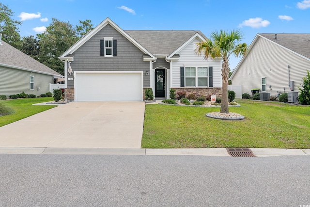 462 Pacific Commons Dr, Surfside Beach, SC 29575 - craftsman-style home with a garage, concrete driveway, cooling unit, and stone siding