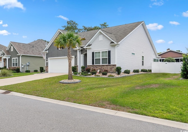 462 Pacific Commons Dr, Surfside Beach, SC 29575 - view of front facade featuring concrete driveway, an attached garage, and stone siding