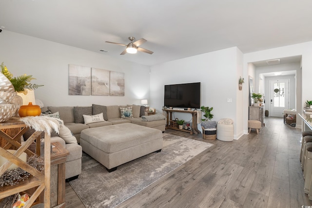 462 Pacific Commons Dr, Surfside Beach, SC 29575 - living room featuring a ceiling fan and wood finished floors