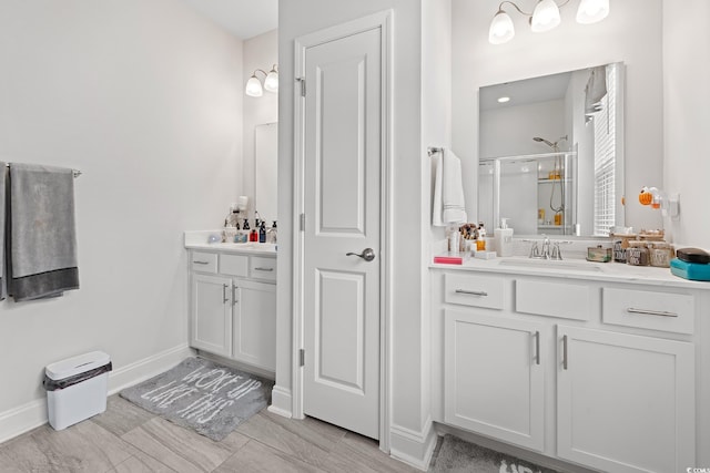 462 Pacific Commons Dr, Surfside Beach, SC 29575 - full bathroom featuring vanity, a shower stall, and baseboards