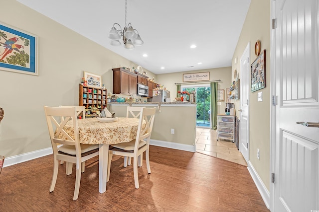 837 Triple Ct Unit 837, Myrtle Beach, SC 29588 - dining area featuring a chandelier, light wood-type flooring, and recessed lighting