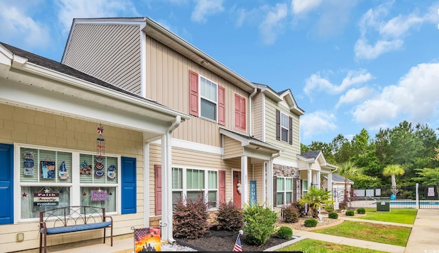 837 Triple Ct Unit 837, Myrtle Beach, SC 29588 - multi unit property featuring a community pool and board and batten siding