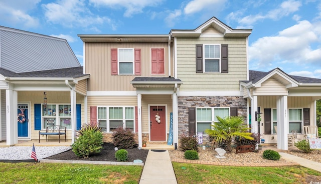837 Triple Ct Unit 837, Myrtle Beach, SC 29588 - townhome / multi-family property featuring covered porch, stone siding, and roof with shingles