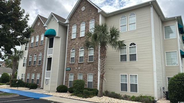 9779 Leyland Dr Unit 3, Myrtle Beach, SC 29572 - view of property with uncovered parking