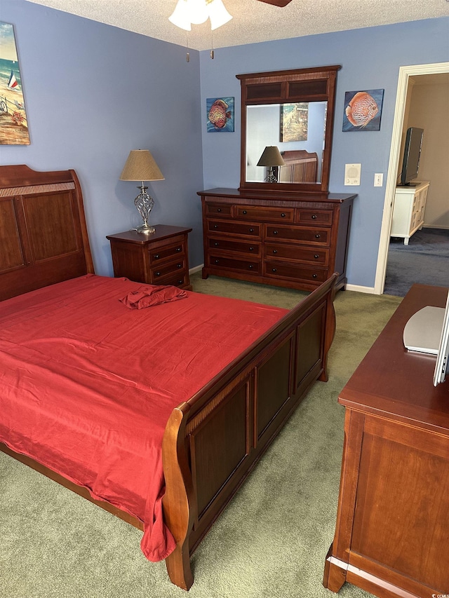 9779 Leyland Dr Unit 3, Myrtle Beach, SC 29572 - bedroom with carpet, baseboards, a textured ceiling, and ceiling fan