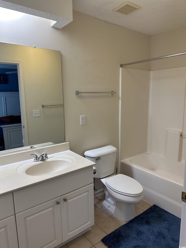 9779 Leyland Dr Unit 3, Myrtle Beach, SC 29572 - full bath with toilet, vanity, tile patterned flooring,  shower combination, and a textured ceiling
