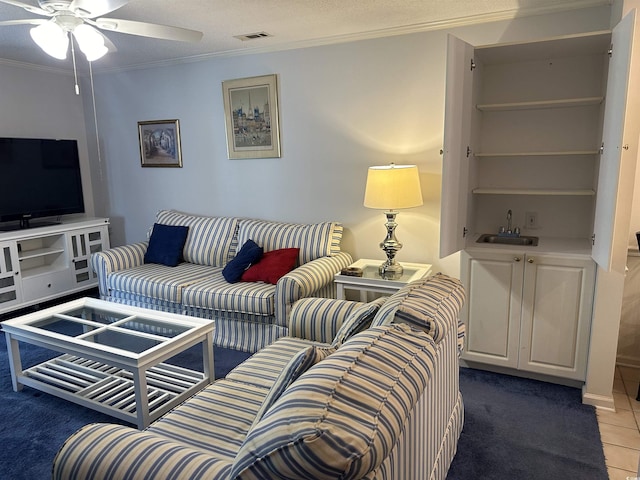 9779 Leyland Dr Unit 3, Myrtle Beach, SC 29572 - tiled living area featuring ornamental molding, a ceiling fan, and a sink