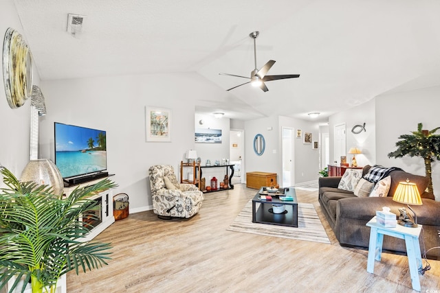 127 Coachman Ln, Surfside Beach, SC 29575 - living area with baseboards, wood finished floors, a ceiling fan, and vaulted ceiling