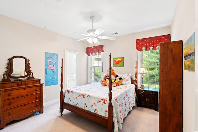 6572 Wellington Dr, Murrells Inlet, SC 29576 - carpeted bedroom with a ceiling fan and ensuite bathroom