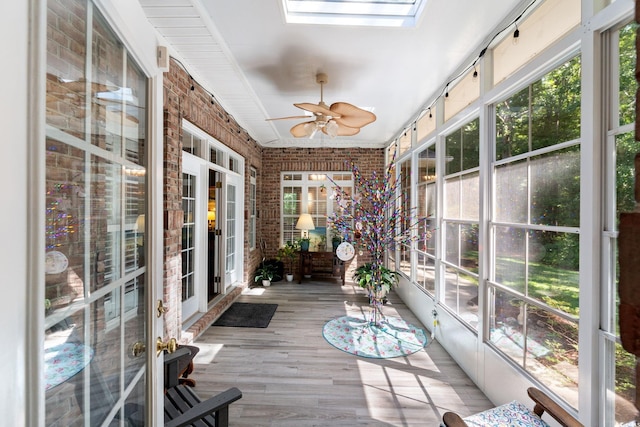 6572 Wellington Dr, Murrells Inlet, SC 29576 - unfurnished sunroom featuring healthy amount of natural light, a ceiling fan, and a skylight
