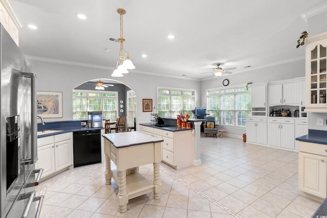 6572 Wellington Dr, Murrells Inlet, SC 29576 - kitchen with dishwasher, a ceiling fan, stainless steel refrigerator with ice dispenser, arched walkways, and crown molding