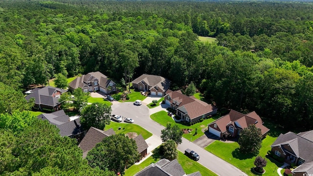 6572 Wellington Dr, Murrells Inlet, SC 29576 - aerial perspective of suburban area featuring a heavily wooded area