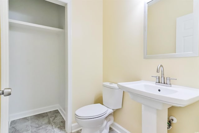 155 Mckenzie Cir, Pawleys Island, SC 29585 - half bath featuring toilet and marble finish flooring
