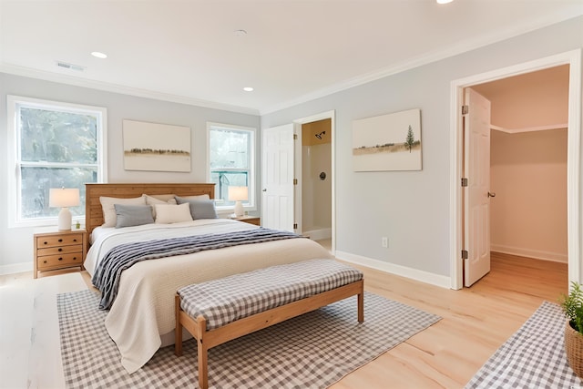 155 Mckenzie Cir, Pawleys Island, SC 29585 - bedroom with crown molding, light wood-style flooring, and recessed lighting