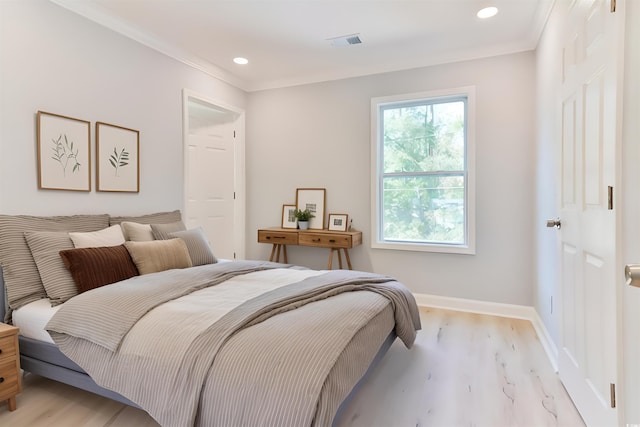155 Mckenzie Cir, Pawleys Island, SC 29585 - bedroom featuring light wood-style floors, recessed lighting, and ornamental molding