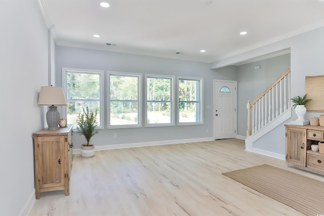 155 Mckenzie Cir, Pawleys Island, SC 29585 - foyer entrance with stairway, light wood finished floors, recessed lighting, and crown molding