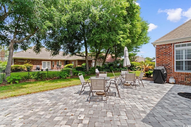 702 Compass Point Dr, North Myrtle Beach, SC 29582 - view of patio / terrace with grilling area and outdoor dining area