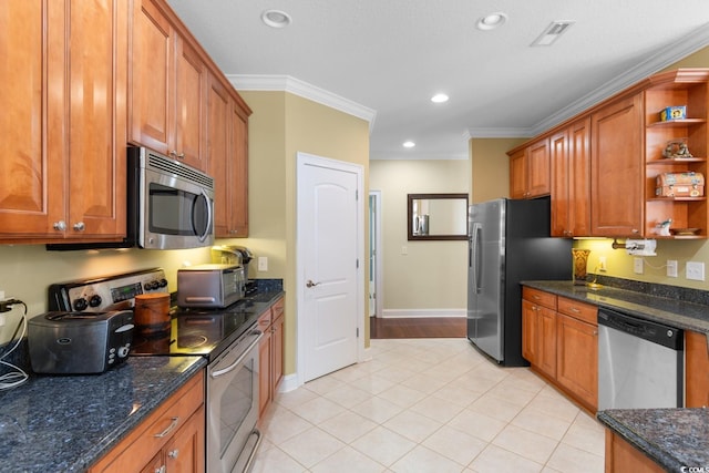 702 Compass Point Dr, North Myrtle Beach, SC 29582 - kitchen with stainless steel appliances, open shelves, crown molding, light tile patterned flooring, and brown cabinets