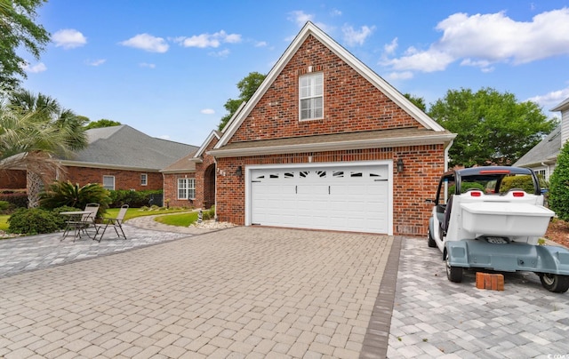 702 Compass Point Dr, North Myrtle Beach, SC 29582 - traditional-style house with brick siding and decorative driveway