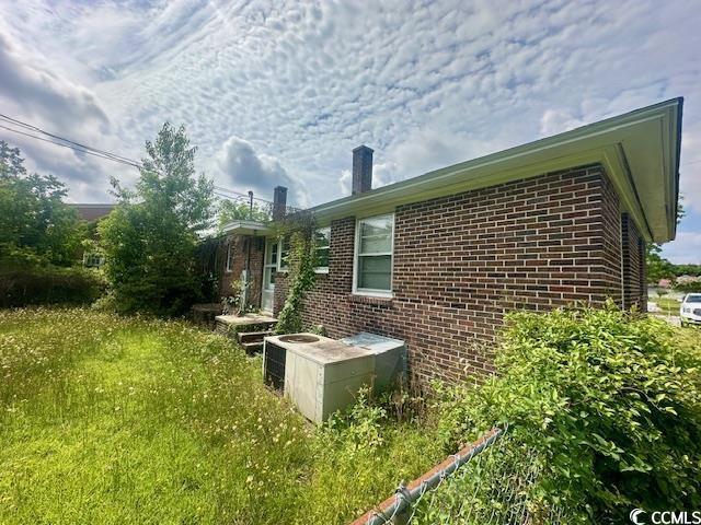 905 E Main St, Dillon, SC 29536 - view of home's exterior with brick siding