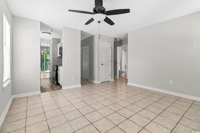 1676 Citadel Ln, Myrtle Beach, SC 29577 - unfurnished room featuring ceiling fan, plenty of natural light, and light tile patterned flooring