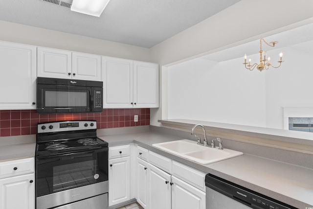 4505 Lightkeepers Way Unit 24B, Little River, SC 29566 - kitchen featuring stainless steel appliances, a sink, and white cabinetry