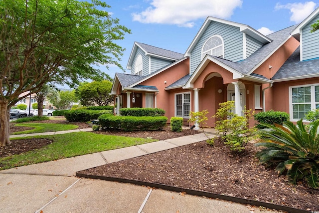 4505 Lightkeepers Way Unit 24B, Little River, SC 29566 - view of front of home featuring a shingled roof and stucco siding