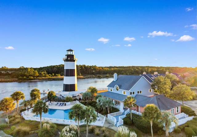 4505 Lightkeepers Way Unit 24B, Little River, SC 29566 - drone / aerial view of a large body of water, a forest, and a pool
