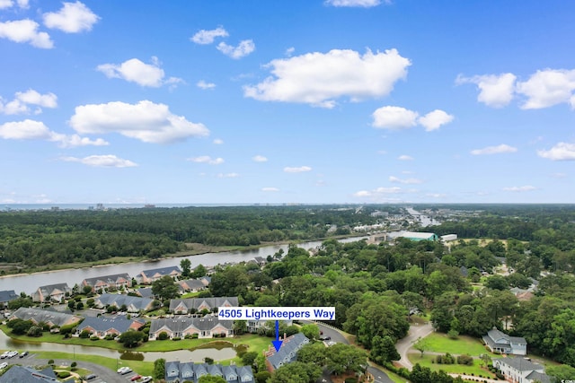 4505 Lightkeepers Way Unit 24B, Little River, SC 29566 - bird's eye view of a forest and a large body of water