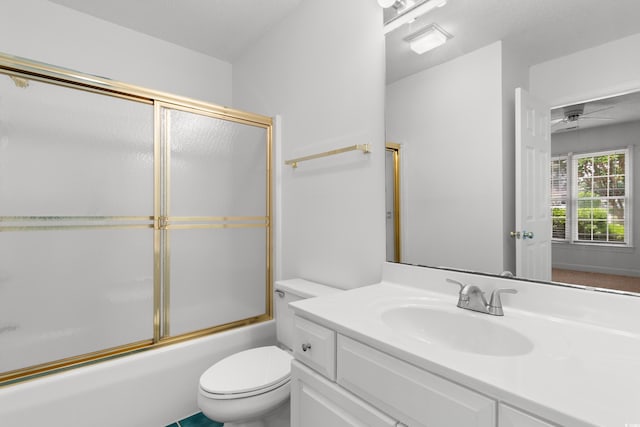 4505 Lightkeepers Way Unit 24B, Little River, SC 29566 - full bathroom featuring toilet, vanity, enclosed tub / shower combo, and ceiling fan