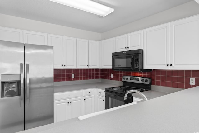 4505 Lightkeepers Way Unit 24B, Little River, SC 29566 - kitchen featuring black appliances, light countertops, white cabinets, and tasteful backsplash