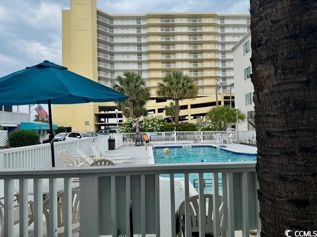 5409 N Ocean Blvd Unit 111, North Myrtle Beach, SC 29582 - community pool featuring a patio area